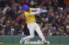 Boston Red Sox's Trevor Story hits a three-run home run in the seventh inning of a baseball game against the Chicago White Sox, Friday, April 18, 2025, in Boston. (AP Photo/Steven Senne)