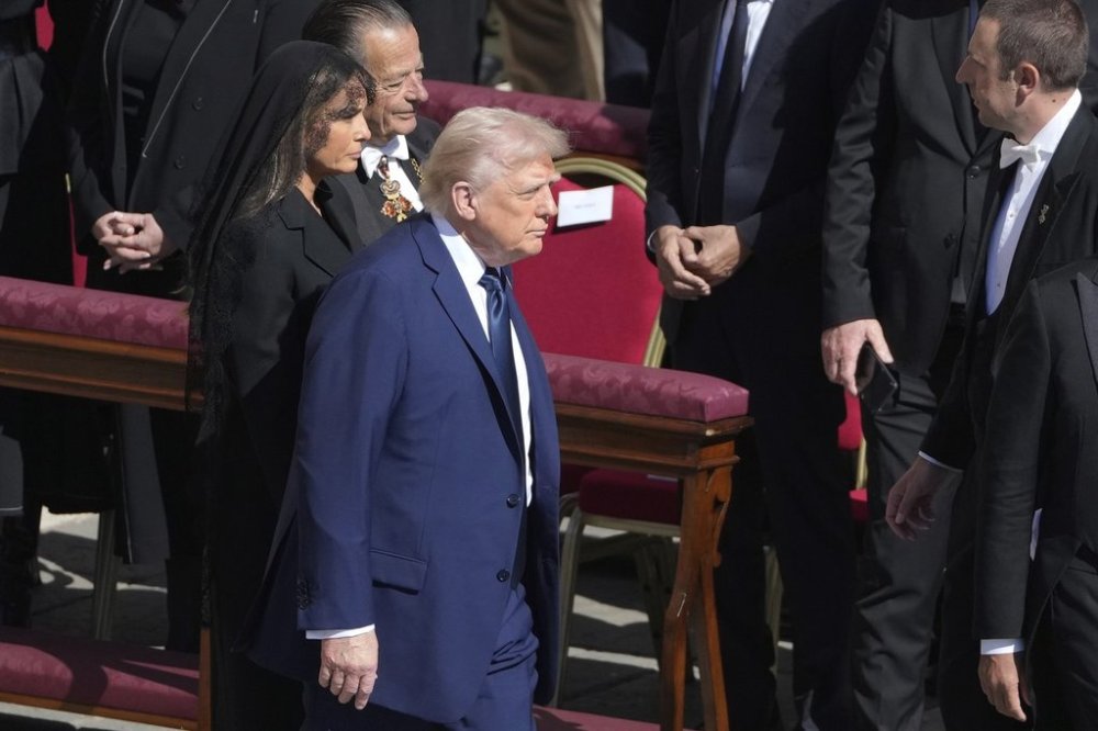President Donald Trump and first lady Melania Trump arrive for the funeral of Pope Francis in St. Peter's Square at the Vatican, Saturday, April 26, 2025. (AP Photo/Markus Schreiber)