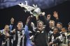 Newcastle United manager Eddie Howe with the Carabao Cup celebrates with his team. during the Carabao Cup trophy parade in Newcastle, England, Saturday March 29, 2025. (Danny Lawson/PA via AP)