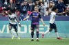 Vancouver Whitecaps' Sam Adekugbe (3) and teammate Jayden Nelson (7) celebrate Adekugbe's goal as Los Angeles Galaxy's John Nelson (14) walks away during the first half of an MLS soccer match in Vancouver, B.C., Sunday, March 2, 2025. THE CANADIAN PRESS/Ethan Cairns