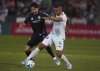 Colorado Rapids defender Reggie Cannon, right, clears the ball as San Diego FC midfielder Luca De La Torre, left, defends in the first half of an MLS soccer match Saturday, April 12, 2025, in Commerce City, Colo. (AP Photo/David Zalubowski)
