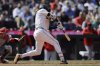Seattle Mariners' J.P. Crawford hits a two RBI single against the Los Angeles Angels during the seventh inning of a baseball game, Wednesday, April 30, 2025, in Seattle. (AP Photo/John Froschauer)