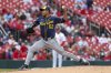 Milwaukee Brewers starting pitcher Jose Quintana throws during the first inning of a baseball game against the St. Louis Cardinals, Sunday, April 27, 2025, in St. Louis. (AP Photo/Scott Kane)