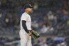 New York Yankees pitcher Marcus Stroman reacts after San Francisco Giants' Tyler Fitzgerald hit a single during the first inning of a baseball game Friday, April 11, 2025, in New York. (AP Photo/Frank Franklin II)