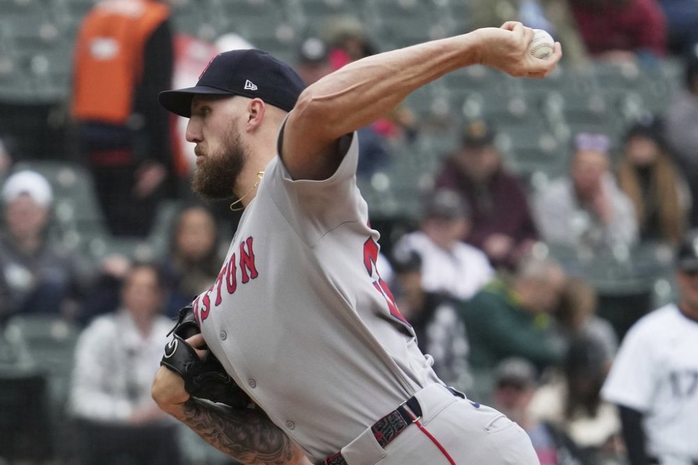 Boston Red Sox starting pitcher Garrett Crochet throws against the Chicago White Sox during the first inning of a baseball game in Chicago, Sunday, April 13, 2025. (AP Photo/Nam Y. Huh)