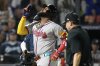 Atlanta Braves' Marcell Ozuna celebrates after his solo home run off Tampa Bay Rays pitcher Edwin Uceta during the eighth inning of a baseball game Friday, April 11, 2025, in Tampa, Fla. (AP Photo/Chris O'Meara)