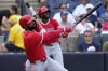 Los Angeles Angels' Jo Adell watches his solo home run off Tampa Bay Rays pitcher Zack Littell during the fifth inning of a baseball game Thursday, April 10, 2025, in Tampa, Fla. (AP Photo/Chris O'Meara)