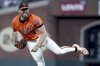 San Francisco Giants pitcher Robbie Ray throws against the Colorado Rockies during the fourth inning of a baseball game in San Francisco, Friday, May 2, 2025. (AP Photo/Jed Jacobsohn)