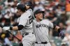New York Yankees' Aaron Judge, left, celebrates with Ben Rice (22) after hitting a home run during the first inning of a baseball game against the Baltimore Orioles, Tuesday, April 29, 2025, in Baltimore. (AP Photo/Stephanie Scarbrough)