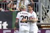 AC Milan's Christian Pulisic, right, celebrates scoring his side's opening goal during the Serie A soccer match between Venezia and AC Milan at the Pier Luigi Penzo Stadium, in Venice, Italy, Sunday, April 27, 2025. (Paola Garbuio/LaPresse via AP)