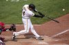 Pittsburgh Pirates' Joey Bart singles off St. Louis Cardinals pitcher Chris Roycroft, driving in the winning run in the 13th inning of a baseball game in Pittsburgh, Wednesday, April 9, 2025. (AP Photo/Gene J. Puskar)