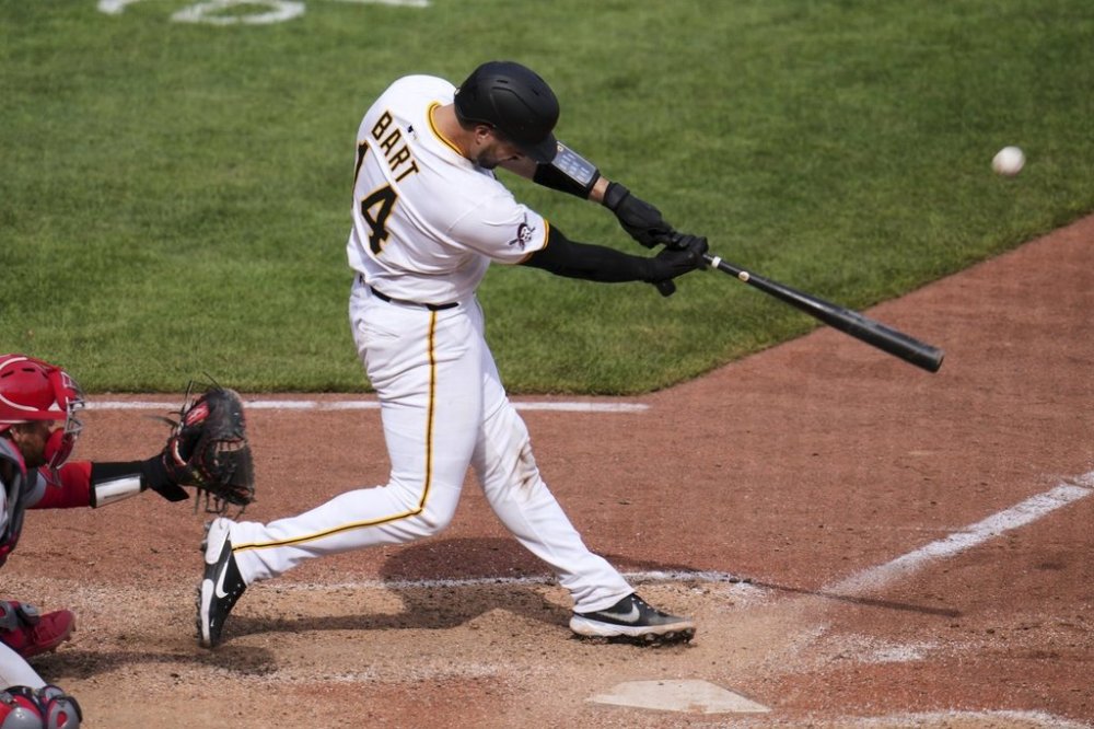 Pittsburgh Pirates' Joey Bart singles off St. Louis Cardinals pitcher Chris Roycroft, driving in the winning run in the 13th inning of a baseball game in Pittsburgh, Wednesday, April 9, 2025. (AP Photo/Gene J. Puskar)