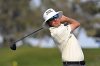 FILE - Joel Dahmen hits his tee shot on the fifth hole on the South Course at Torrey Pines during the third round of the Farmers Insurance Open golf tournament, Jan. 24, 2025, in San Diego. (AP Photo/Denis Poroy, file)
