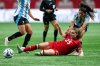 Canada's Emma Regan (25), captain of AFC Toronto in the new Northern Super League, and Argentina's Daiana Falfan, right, vie for the ball during the second half of an international friendly soccer match in Vancouver, on Friday, April 4, 2025. THE CANADIAN PRESS/Ethan Cairns