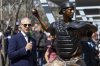 Former Minnesota Twins player Joe Mauer speaks after his statue was unveiled before a baseball game between the Minnesota Twins and the Detroit Tigers Sunday, April 13, 2025, in Minneapolis. (AP Photo/Matt Krohn)