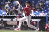 Arizona Diamondbacks' Pavin Smith hits a solo home run during the first inning of a baseball game against the Miami Marlins, Thursday, April 17, 2025, in Miami. (AP Photo/Lynne Sladky)