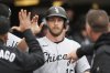 Chicago White Sox's Austin Slater (15) celebrates after scoring against the Detroit Tigers in the ninth inning during a baseball game, Friday, April 4, 2025, in Detroit. (AP Photo/Paul Sancya)