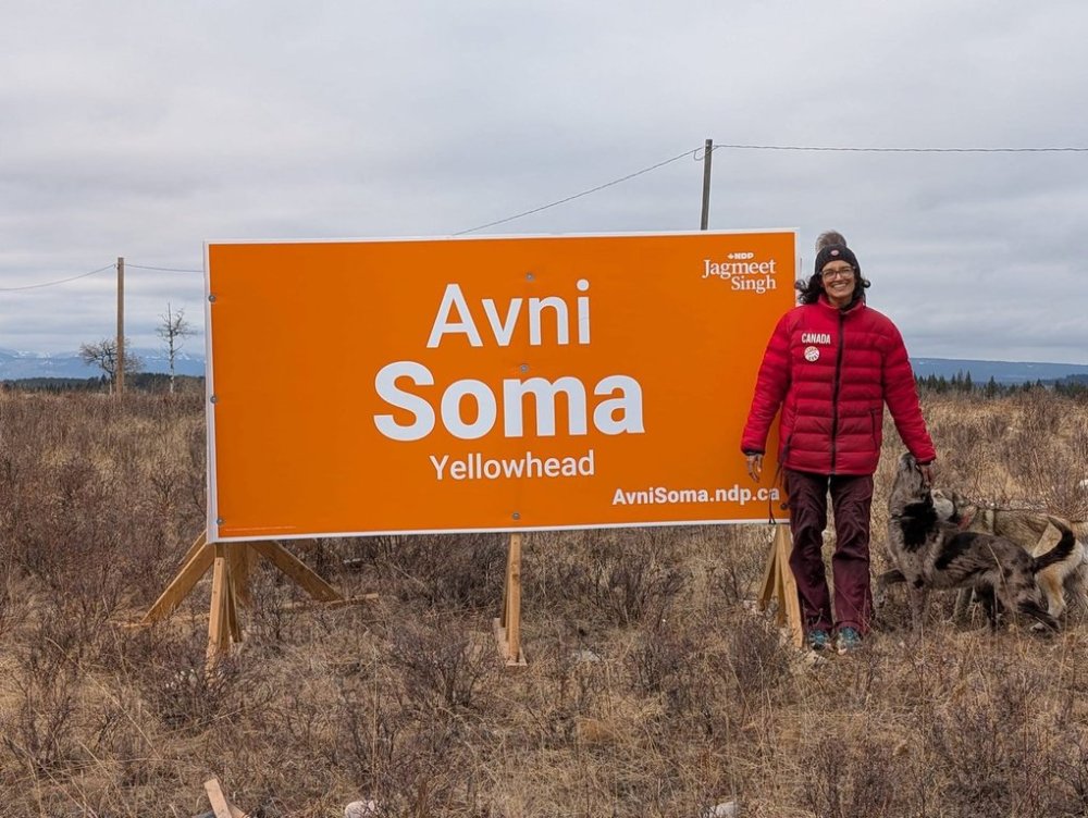 Avni Soma, the federal NDP candidate in the new Yellowhead electoral district, is seen with one of her election signs in this undated handout photo. THE CANADIAN PRESS/HO, Avni Soma ** MANDATORY CREDIT **