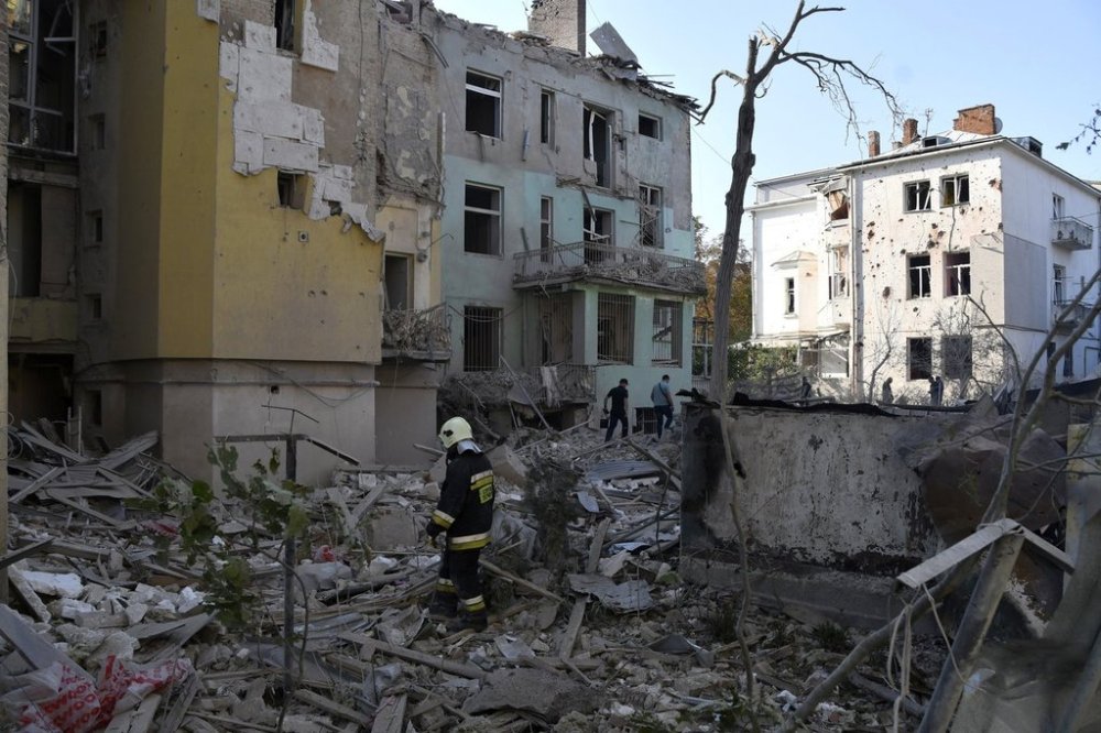 Rescuers search for victims in an apartment building destroyed by a Russian missile attack in the centre of Lviv, Western Ukraine on Sept. 4, 2024. THE CANADIAN PRESS/AP-Mykola Tys