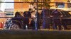 Vancouver Police look over a black car believed to be involved in an incident where a vehicle drove into a crowd at the Lapu Lapu Festival in Vancouver on Saturday April 26, 2025. THE CANADIAN PRESS/Rich Lam