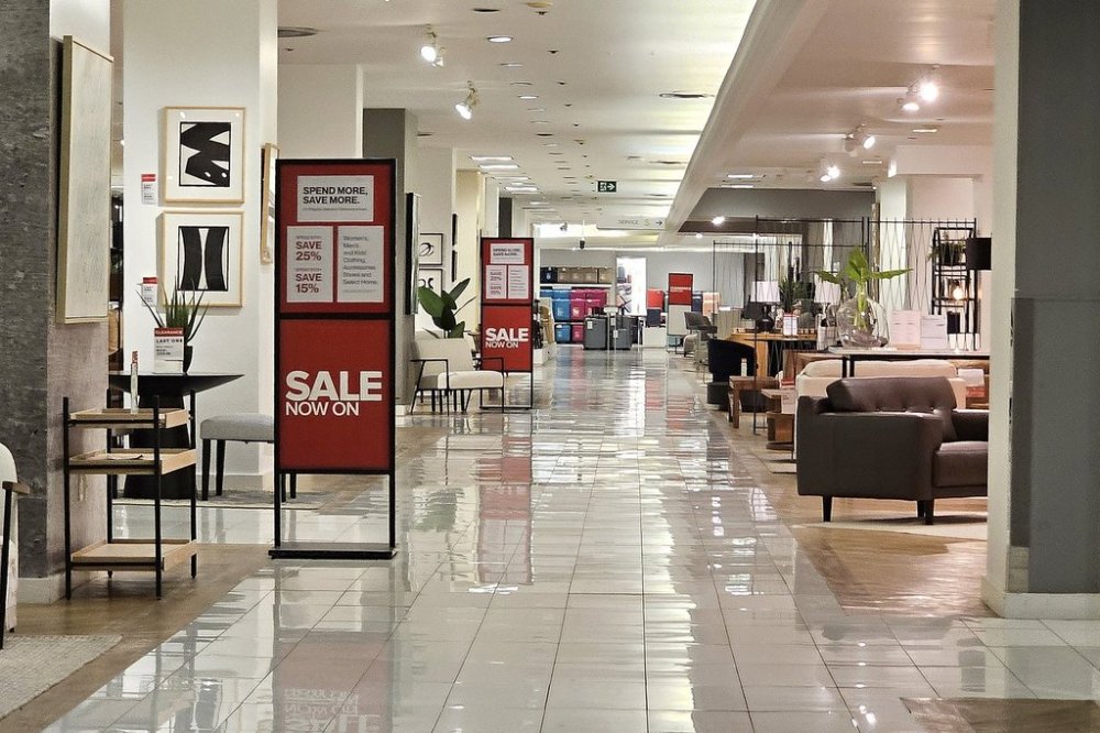 Sale signage is seen at the Hudson's Bay store in Toronto, Tuesday, April 22, 2025. THE CANADIAN PRESS/Giordano Ciampini