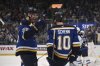 St. Louis Blues' Brayden Schenn (10) celebrates with Colton Parayko (55) after scoring against the Winnipeg Jets during the second period in Game 4 of an NHL hockey first-round playoff series Sunday, April 27, 2025, in St. Louis. (AP Photo/Connor Hamilton)
