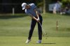 Justin Thomas hits from the eighth fairway during the first round of the RBC Heritage golf tournament, Thursday, April 17, 2025, in Hilton Head Island, S.C. (AP Photo/Mike Stewart)