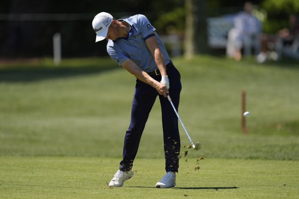 Justin Thomas hits from the eighth fairway during the first round of the RBC Heritage golf tournament, Thursday, April 17, 2025, in Hilton Head Island, S.C. (AP Photo/Mike Stewart)