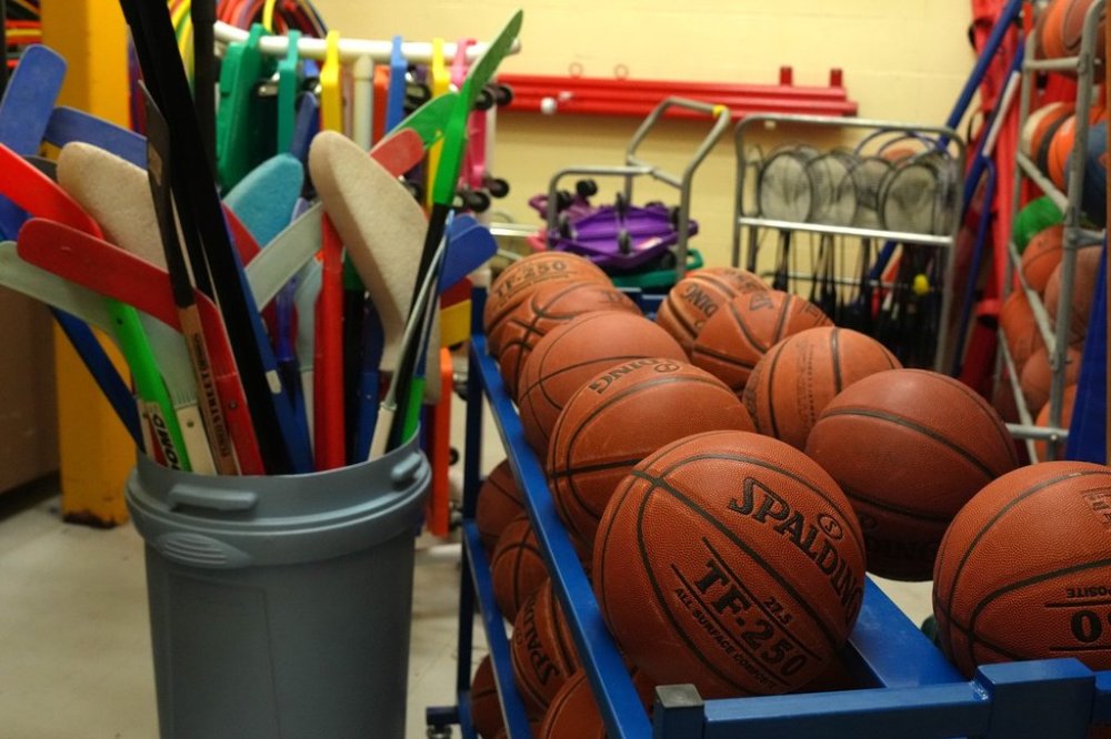 Sports equipment is held in the storage room next to the gym at an elementary school in Toronto on Tuesday, January 9, 2024. THE CANADIAN PRESS/Chris Young