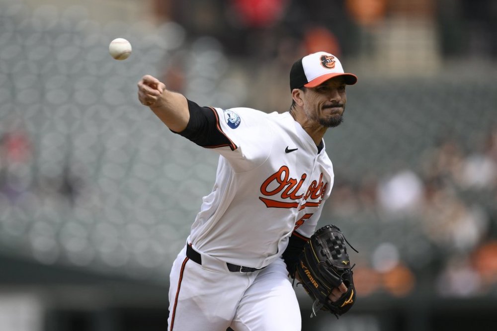 Baltimore Orioles starting pitcher Charlie Morton throws during the first inning of a baseball game against the Cincinnati Reds, Sunday, April 20, 2025, in Baltimore. (AP Photo/Nick Wass)