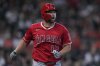 Los Angeles Angels' Nolan Schanuel runs the bases after hitting a solo home run during the second inning of a baseball game against the Houston Astros, Sunday, April 13, 2025, in Houston. (AP Photo/Kevin M. Cox)