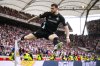 Bremen's Oliver Burke celebrates after scoring his side's second goal during the German Bundesliga soccer match between VfB Stuttgart and Werder Bremen in Stuttgart, Germany, Sunday, April 13, 2025. (Tom Weller/dpa via AP)