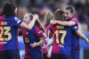 Barcelona's Ingrid Syrstad Engen, Claudia Pina, Ewa Pajor and Patri Guijarro, from left, celebrate after defeating Chelsea 4-1 in their women's Champions League semifinals, first leg, soccer match at the Johan Cruyff Stadium, in Sant Joan Despi, outside Barcelona, Spain, Sunday, April 20, 2025. (AP Photo/Bagu Blanco)