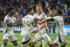 Vancouver Whitecaps' Brian White (second left) celebrates his goal against Pumas UNAM with Emmanuel Sabbi (left), Ranko Veselinovic (second right) and Edier Ocampo (right) during the second half of a CONCACAF Champions Cup quarterfinal soccer match, in Vancouver, on Wednesday, April 2, 2025. THE CANADIAN PRESS/Christopher Morris