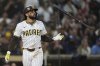San Diego Padres' Fernando Tatis Jr. flips his bat after striking out during the eighth inning of a baseball game against the Tampa Bay Rays Saturday, April 26, 2025, in San Diego. (AP Photo/Gregory Bull)
