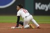 Cleveland Guardians' Jose Ramirez (11) steals second base in the seventh inning of a baseball game against the Minnesota Twins in Cleveland, Wednesday, April 30, 2025. (AP Photo/Sue Ogrocki)