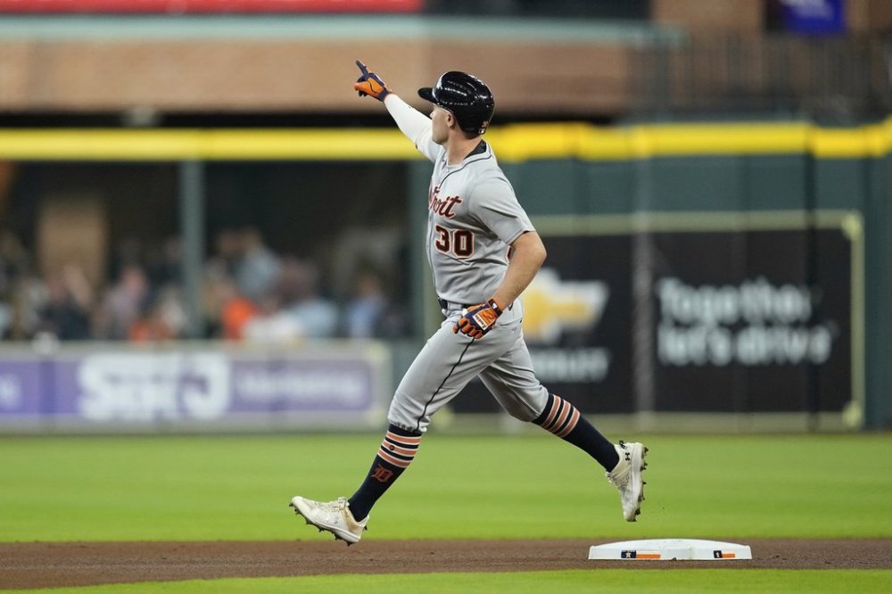 Detroit Tigers' Kerry Carpenter (30) celebrates after hitting a home run against the Houston Astros during the first inning of a baseball game Tuesday, April 29, 2025, in Houston. (AP Photo/David J. Phillip)