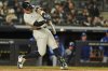 New York Yankees' Aaron Judge hits a double during the third inning of a baseball game against the Kansas City Royals Wednesday, April 16, 2025, in New York. (AP Photo/Frank Franklin II)