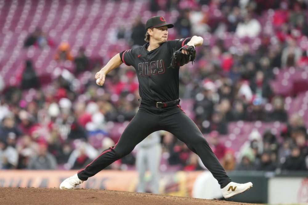 Cincinnati Reds pitcher Brady Singer throws against the Pittsburgh Pirates during the third inning of a baseball game, Friday, April 11, 2025, in Cincinnati. (AP Photo/Jeff Dean)