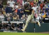 San Diego Padres' Fernando Tatis Jr. reacts after his home run against Houston Astros relief pitcher Tayler Scott during the seventh inning of a baseball game Sunday, April 20, 2025, in Houston. (AP Photo/Karen Warren)