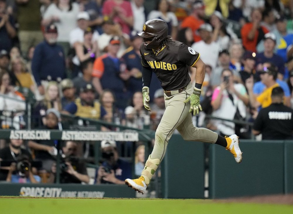 San Diego Padres' Fernando Tatis Jr. reacts after his home run against Houston Astros relief pitcher Tayler Scott during the seventh inning of a baseball game Sunday, April 20, 2025, in Houston. (AP Photo/Karen Warren)