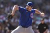 Chicago Cubs relief pitcher Luke Little works against a San Diego Padres batter during the eighth inning of a baseball game Wednesday, April 16, 2025, in San Diego. (AP Photo/Gregory Bull)