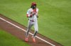 Cincinnati Reds' Elly De La Cruz, right, celebrates his three-run home run during the third inning of a baseball game against the Baltimore Orioles, Friday, April 18, 2025, in Baltimore. (AP Photo/Nick Wass)