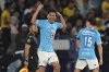 Angel Sepulveda of Mexico's Cruz Azul celebrates scoring his side's 2nd goal against Mexico's America during a CONCACAF Champions Cup second leg quarterfinal soccer match in Mexico City, Tuesday, April 8, 2025. (AP Photo/Eduardo Verdugo)