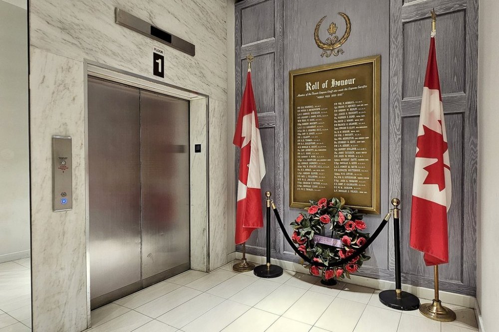 The Roll of Honour, a memorial to employees of the defunct retailer Simpson's who served with the Canadian Forces and were killed during the Second World War, is shown at the Hudson's Bay store in Toronto, Tuesday, April 22, 2025. THE CANADIAN PRESS/Giordano Ciampini