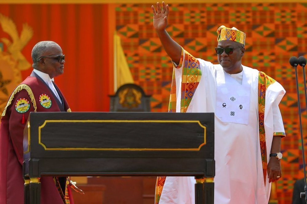 FILE - Ghana's President-Elect John Dramani Mahama, waves after taking the oath of office at his inauguration, at the Independence Square in Accra, Ghana, Jan. 7, 2025. (AP Photo/Misper Apawu, file)