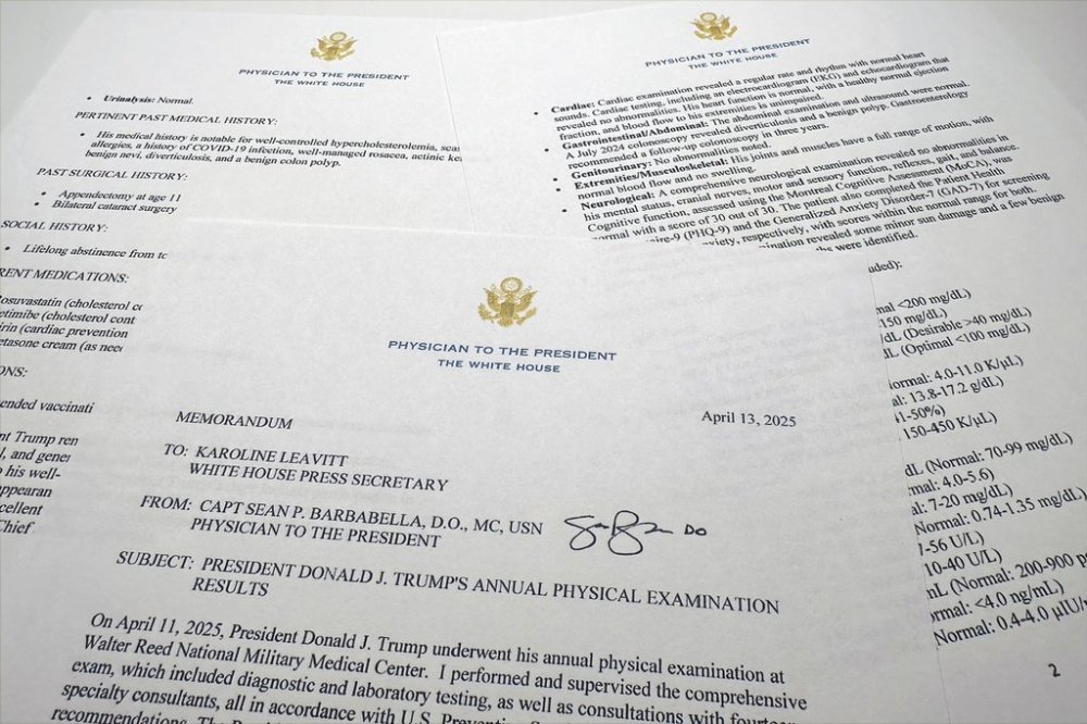 The report on President Donald Trump's health after his physical on April 11, 2025, at Walter Reed National Military Medical Center, released by the White House on behalf of his physician Navy Capt. Sean Barbabella, is photographed Sunday, April 13, 2025. (AP Photo/Jon Elswick)
