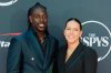 FILE - NBA basketball player Jrue Holiday, left, and former professional soccer player Lauren Holiday arrive at the ESPY awards on Wednesday, July 12, 2023, at the Dolby Theatre in Los Angeles. (AP Photo/Chris Pizzello, File)