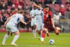 Toronto FC's Theo Corbeanu (right) scores as CF Montreal's Samuel Piette (6) defends during first half Canadian Championship preliminary round soccer action in Toronto on Wednesday, April 30, 2025. THE CANADIAN PRESS/Frank Gunn