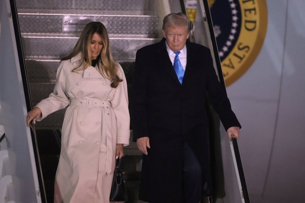 CORRECTS DATE TO APRIL 25 - President Donald Trump and first lady Melania Trump arrive on Air Force One at Rome's Leonardo da Vinci International airport in Fiumicino, Friday, April 25, 2025, to attend the funeral for Pope Francis at the Vatican. (AP Photo/Markus Schreiber)
